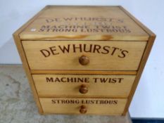 A pine three drawer chest bearing sign writing advertisement,