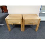 A pair of contemporary oak lamp tables fitted a drawer