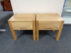 A pair of contemporary oak lamp tables fitted a drawer