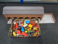 A box containing a quantity of Golden Bear plastic, Thomas the Tank Engine engines,