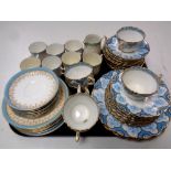 A tray containing 27 pieces of blue and white gilt rimmed bone tea china together with a further