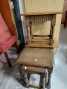 A pair of oak low tables together with an oak nest of two tables