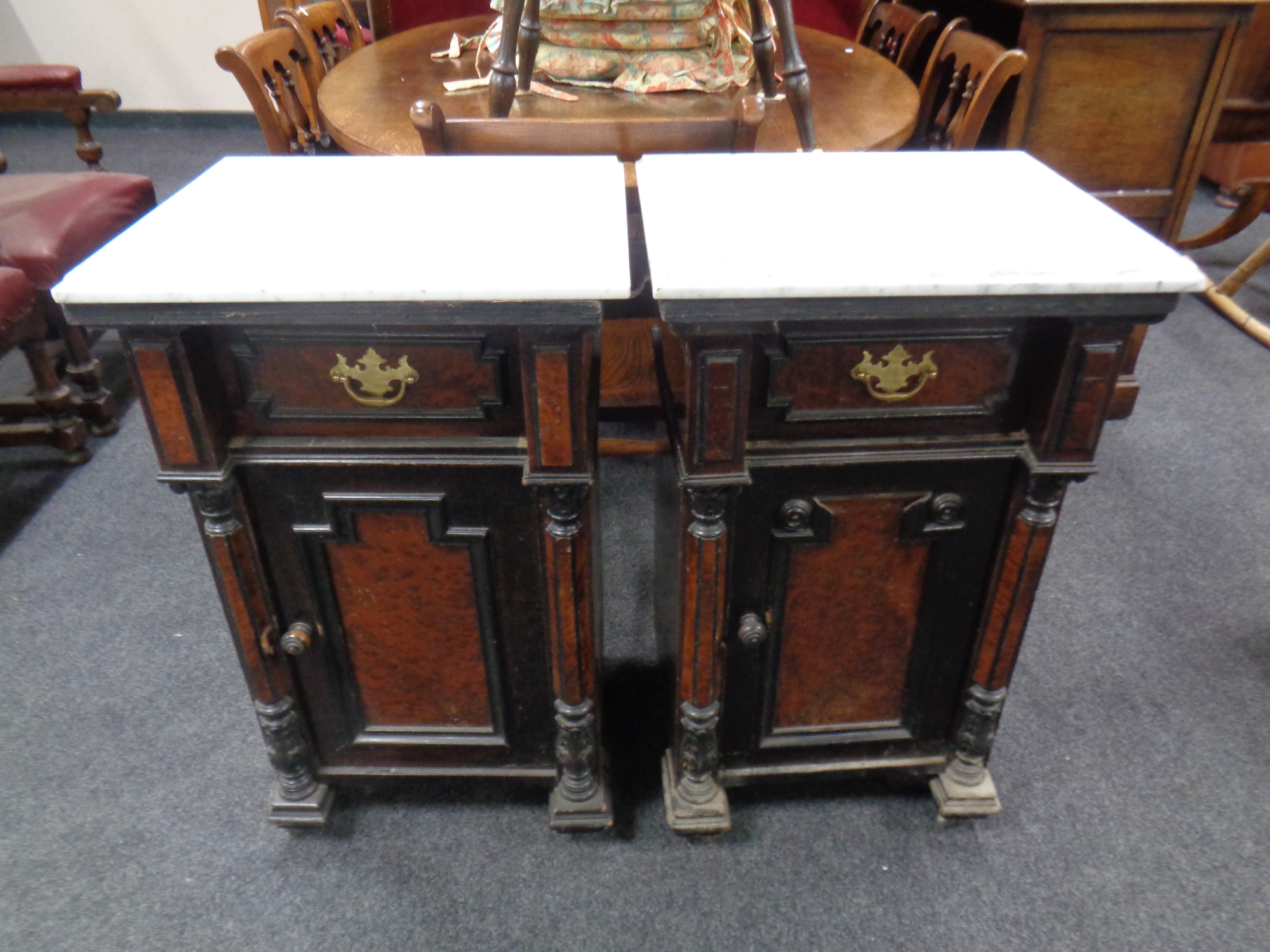 A pair of 19th century marble topped pot cupboards fitted a drawer