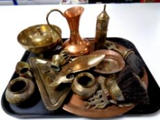 A tray of copper and brass ware including circular tray, eastern dishes and vases, copper jug,