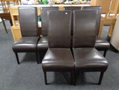 A set of twelve contemporary high backed brown leather dining chairs