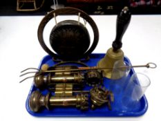 A tray containing a pair of GWR brass carriage lamps, a brass hand bell, toasting fork,