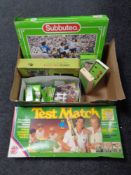 A box containing a quantity of Subbuteo sets, accessories and teams,