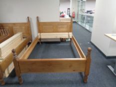 A contemporary pine 4 ft bed frame with mattress slats