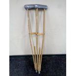 A pair of wooden crutches