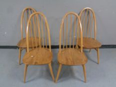 A set of four Ercol solid elm and beech Quaker dining chairs