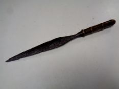 An antique brass handled spearhead, length 28.