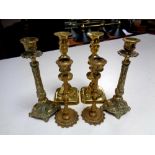 Three pairs of 19th century brass candlesticks