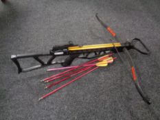 A crossbow with bolts