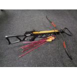 A crossbow with bolts