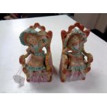 A pair of bisque figures,