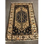 An antique Malayer rug 193 cm x 122 cm