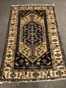 An antique Malayer rug 193 cm x 122 cm