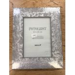 Nineteen Fotolijst photo frames, 13 cm x 18 cm, all brand new and wrapped.