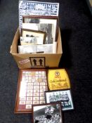 A box containing black and white photographs, scenes of Newcastle and Sunderland,