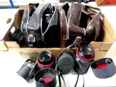 A box of assorted camera lenses and accessories including Asahi Pentax,