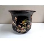 A 19th century hand painted Bretby jardiniere depicting a bird in foliage
