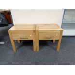 A pair of contemporary oak lamp tables fitted a drawer