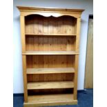 A set of pine open bookshelves, width 125 cm including cornice,