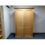 A pine double door wardrobe,