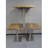 A set of three pine topped metal based cafe tables