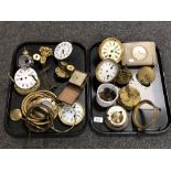 A tray containing a quantity of clock parts and components, mantel clock,