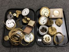 A tray containing a quantity of clock parts and components, mantel clock,