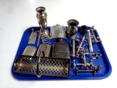 A tray containing assorted plated wares to include hip flasks, knife rests,