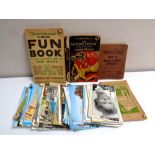 A box containing 20th century tourist postcards, coastal scenes, humorous,