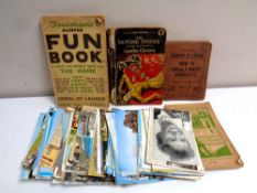 A box containing 20th century tourist postcards, coastal scenes, humorous,