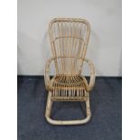 A 20th century Franco Albini bamboo and wicker rocking chair