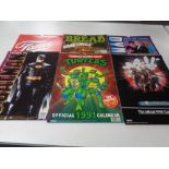 A quantity of vintage film and TV calendars including Ghostbusters 2, Teenage Mutant Ninja Turtles,