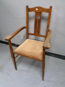 An oak Arts and Crafts armchair