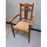 An oak Arts and Crafts armchair