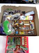 A box containing a large quantity of fishing equipment to include fishing fly, tools and materials,