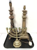 Two reproduction classical style table lamps together with a brass menorah
