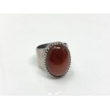 A Scottish silver cabochon agate ring