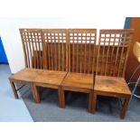 A sheesham wood dining table together with a set of four high back chairs
