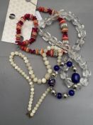 An M&S collection necklace and bracelet set together with two further costume necklaces and a