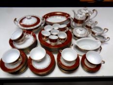 An extensive Surrey China red and white tea and dinner service with gold overlay