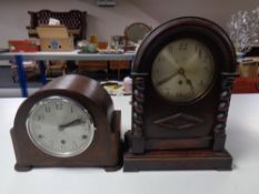 An Edwardian oak and pine mantel clock with silvered dial together with a further oak cased Art
