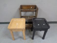 An early 20th century oak stick stand with lift out tray together with two pine stools