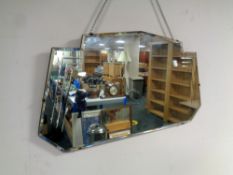 An early 20th century frameless bevelled mirror