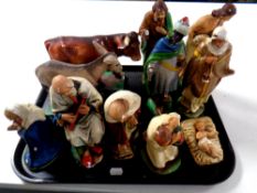 A tray containing eleven painted chalk nativity figures (as found)
