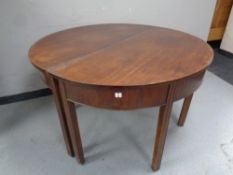 A pair of 19th century mahogany D-end tables