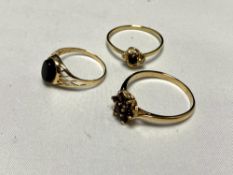 Three 9ct gold rings set with gemstones